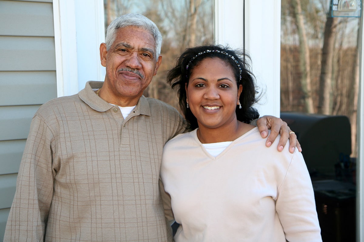 Hispanic father and daughter understanding the risk of Parkinson's disease in the Hispanic community