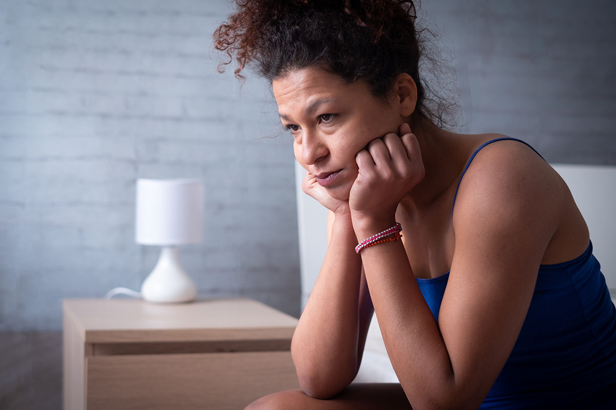 Woman feeling fatigue as a non-motor symptom of PD