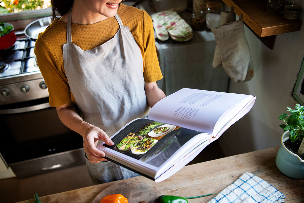 Woman with cookbook