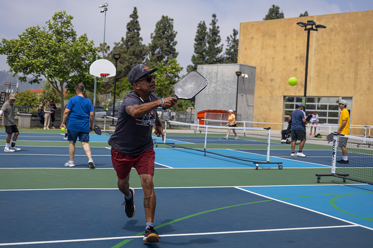 Man playing Pickleball