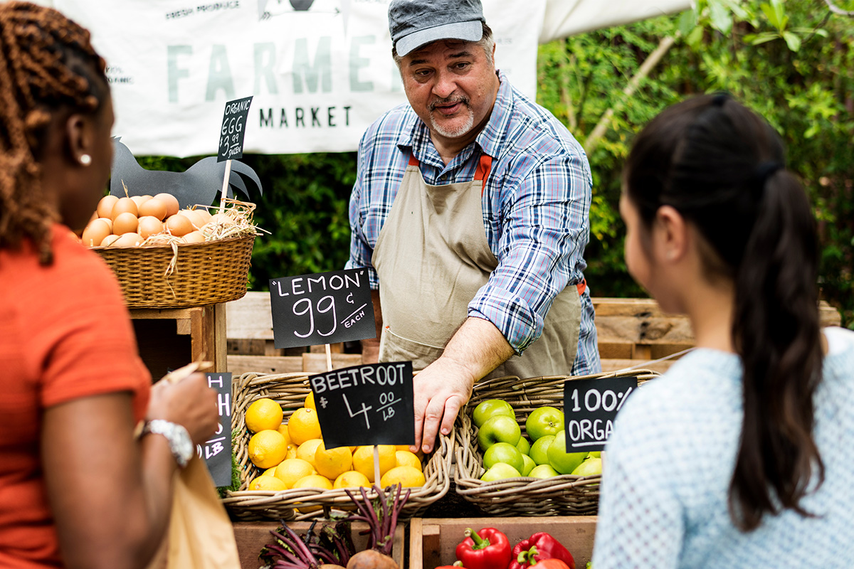 women at a farmers market